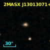 2MASX J13013071+0015545