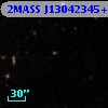 2MASS J13042345+0015179