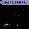 2MASS J13043181+0005077