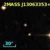 2MASS J13063353+0003302
