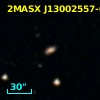 2MASX J13002557-0232383
