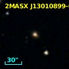 2MASX J13010899-0239318