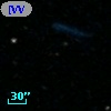 [VV2006] J125734.3-000532
