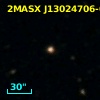 2MASX J13024706-0223040