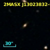 2MASX J13023832-0221350