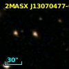 2MASX J13070477-0002211