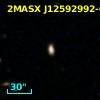 2MASX J12592992-0253510