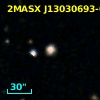 2MASX J13030693-0318475