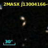 2MASX J13004166-0329469