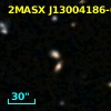 2MASX J13004186-0329339