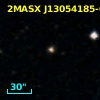2MASX J13054185-0319365