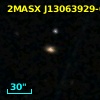 2MASX J13063929-0357265