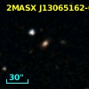 2MASX J13065162-0322301