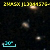 2MASX J13044576-0326324