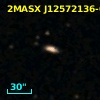 2MASX J12572136-0630033
