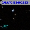 2MASX J13002693-0541403