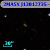 2MASX J13012735-0532210