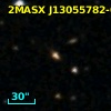 2MASX J13055782-0532523