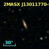 2MASX J13011770-0559326