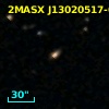 2MASX J13020517-0555598