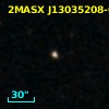 2MASX J13035208-0658265