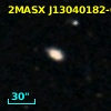 2MASX J13040182-0641215