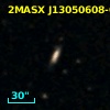 2MASX J13050608-0559107