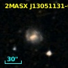 2MASX J13051131-0601297
