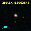 2MASX J13063543-0559002