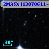 2MASX J13070611-0606428
