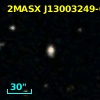 2MASX J13003249-0821350