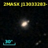 2MASX J13033283-1128111