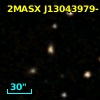 2MASX J13043979-1203494