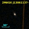 2MASX J13061137-1133129