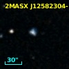 2MASX J12582304-1427354
