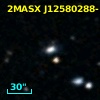 2MASX J12580288-1440090