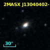 2MASX J13040402-1643558