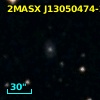 2MASX J13050474-2911128
