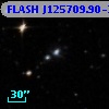 FLASH J125709.90-290305.2