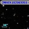 2MASX J12563351-3030093