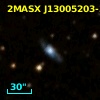 2MASX J13005203-3711038
