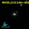 2MASX J13114634+4023536