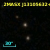 2MASX J13105632+3912421