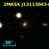 2MASX J13113043+3910586