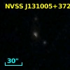 2MASX J13100503+3728584