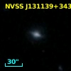 2MASX J13113899+3438113