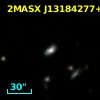 2MASX J13184277+3217382
