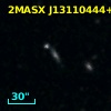 2MASX J13110444+2419410