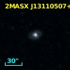 2MASX J13110507+2440040