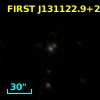 2MASX J13112293+2525140